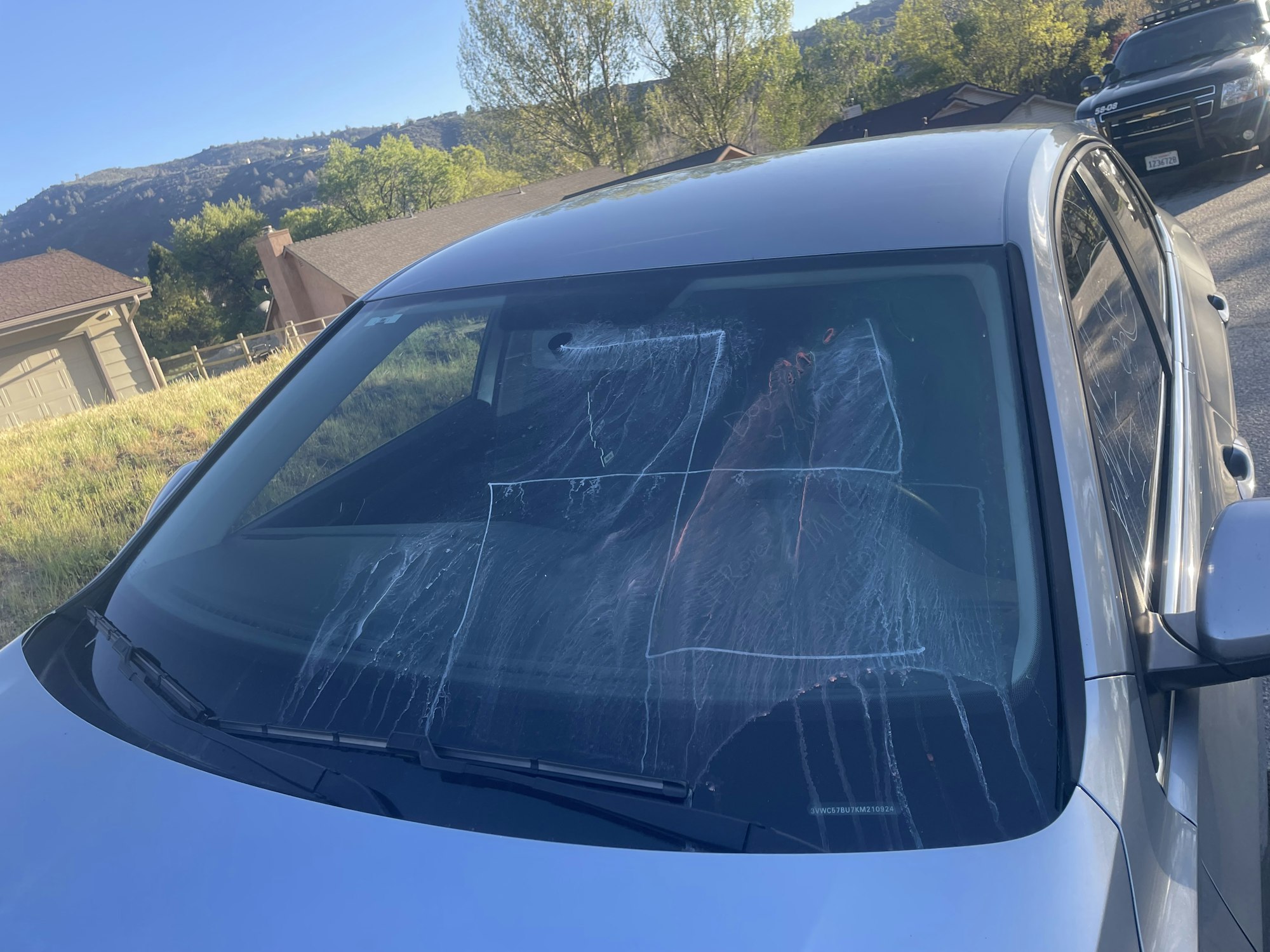 May contain: car, transportation, vehicle, and windshield